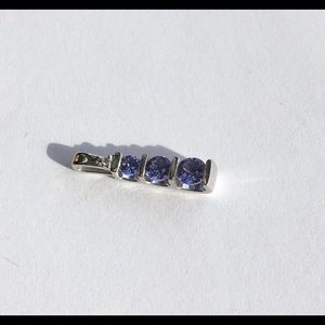 18k white gold tanzanite and diamond pendant